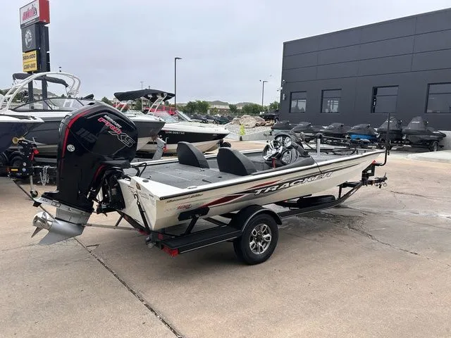 Slide: The Image of 2022 Tracker Pro Team 190 TX boat on trailer outdoors. - 3