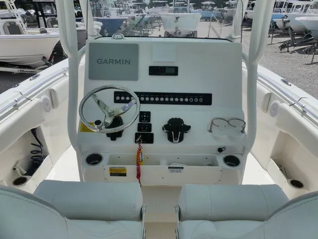 Slide: The Image of Interior view of 2024 Key West 263 FS boat with Garmin controls. - 11