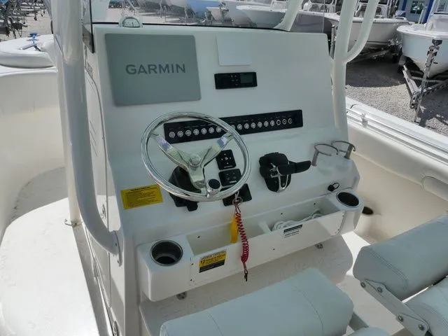 Slide: The Image of Interior view of 2024 Key West 263 FS boat with Garmin controls. - 12