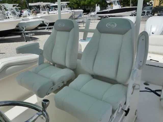Slide: The Image of 2024 Key West 263 FS boat seats in white leather. - 13