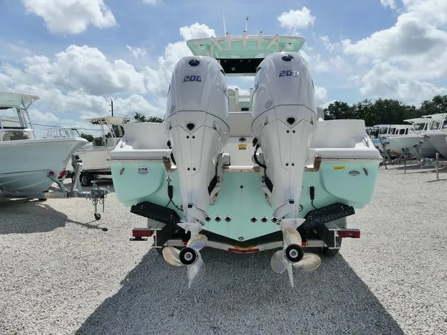 Slide: The Image of 2024 Key West 263 FS boat with dual outboard engines. - 4