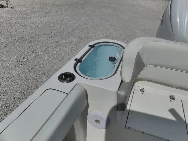 Slide: The Image of Key West 263 FS 2024 boat with seating area and storage. - 7