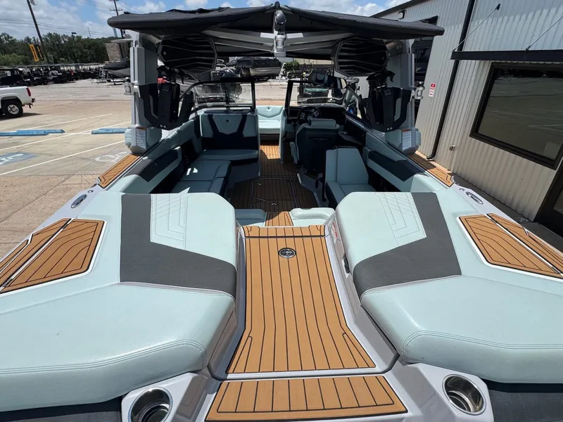 Slide: The Image of Interior view of 2023 Nautique G23 boat with luxurious design. - 10