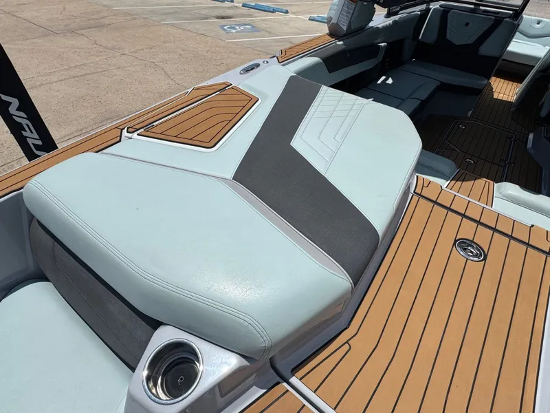 Slide: The Image of Interior of 2023 Nautique G23 with luxurious upholstery. - 12