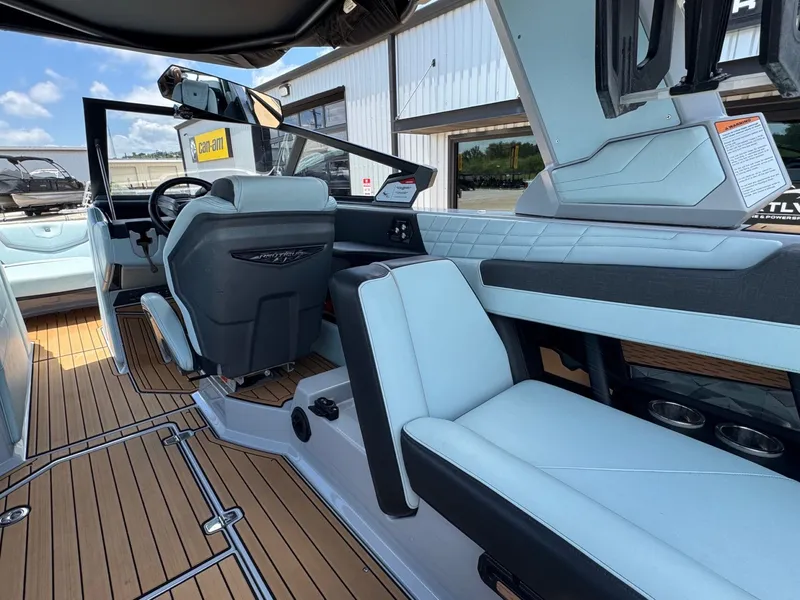 Slide: The Image of Interior of a 2023 Nautique G23 boat with modern seating. - 17