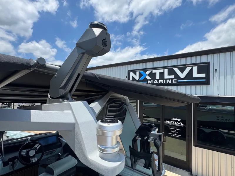Slide: The Image of Nautique G23 2023 at NXT LVL Marine dealership. - 19