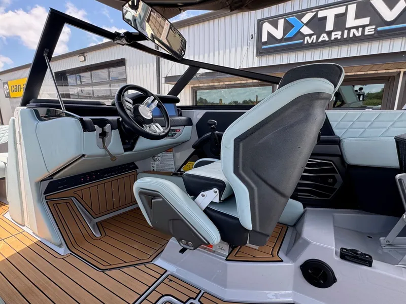 Slide: The Image of Interior of a 2023 Nautique G23 boat at NXT LVL Marine. - 21