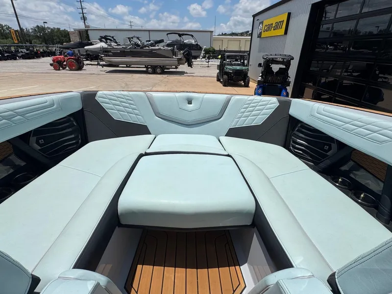 Slide: The Image of Interior of 2023 Nautique G23 with luxurious seating. - 23