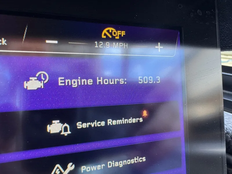 Slide: The Image of Nautique G23 2023 display showing 509.3 engine hours. - 25
