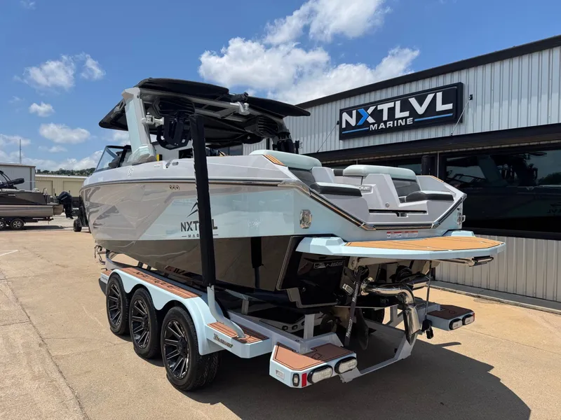Slide: The Image of 2023 Nautique G23 boat at NXT LVL Marine. - 5