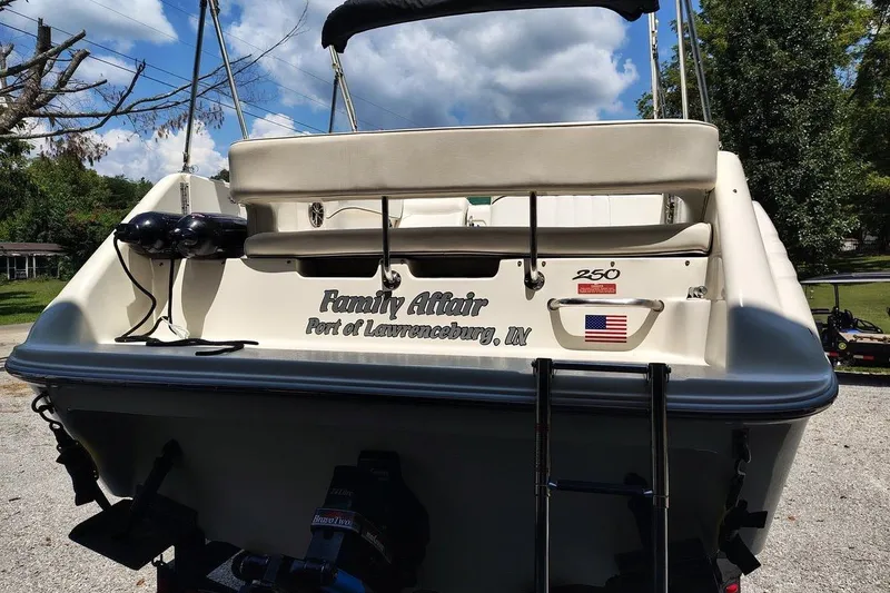 Slide: The Image of 1995 Sea Ray 250 Sundancer boat with "Family Affair" name, docked in Lawrenceburg, IN. - 2