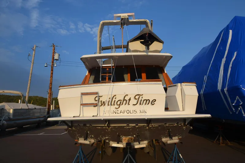 Slide: The Image of 1989 Bayliner 4518 Motoryacht "Twilight Time" docked in Minneapolis, MN under clear sky. - 2