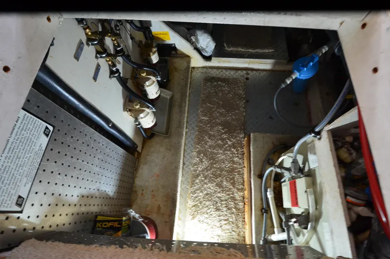Slide: The Image of Engine room of 1989 Bayliner 4518 Motoryacht with visible mechanical components. - 37
