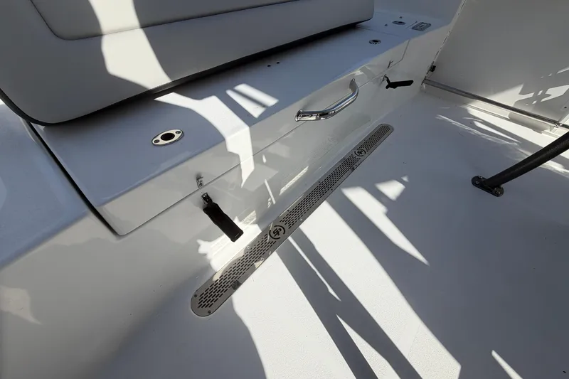 Slide: The Image of Interior view of 2026 Sea Pro 225FLX Sandbar boat, showcasing seating and deck details. - 15