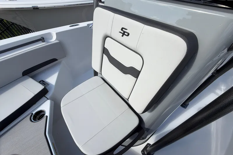 Slide: The Image of 2026 Sea Pro 225FLX Sandbar boat seat with sleek white and black design. - 17