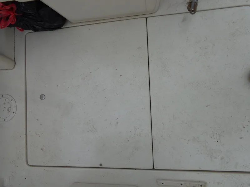 Slide: The Image of Deck of a 1999 Sea Ray Express Cruiser boat. - 36