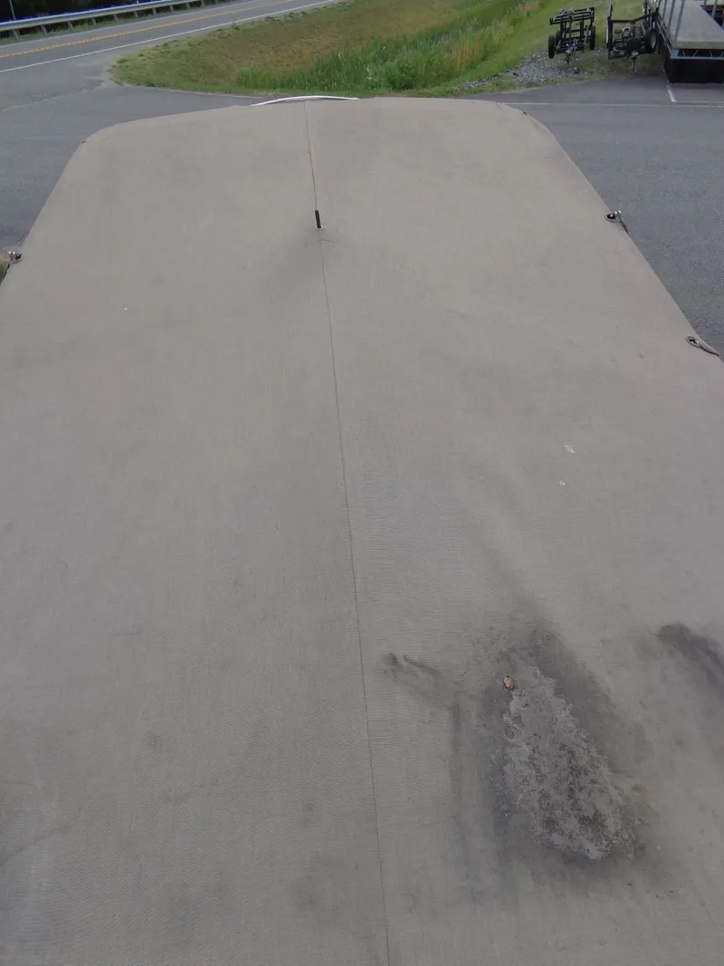Slide: The Image of Cover of a 1999 Sea Ray Express Cruiser boat. - 6