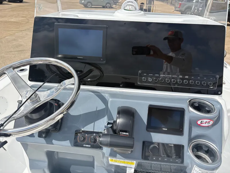 Slide: The Image of Dashboard of the 2026 Tidewater 2110 Bay Max boat. - 11