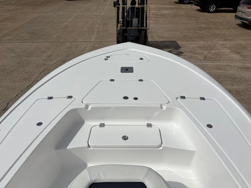 Slide: The Image of Bow deck of a 2026 Tidewater 2110 Bay Max boat. - 12