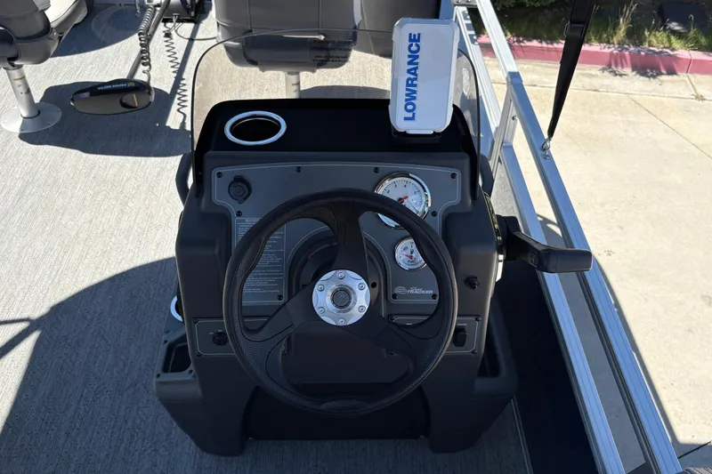 Slide: The Image of Steering console of 2026 Sun Tracker Bass Buggy 18 DLX with Lowrance device. - 25