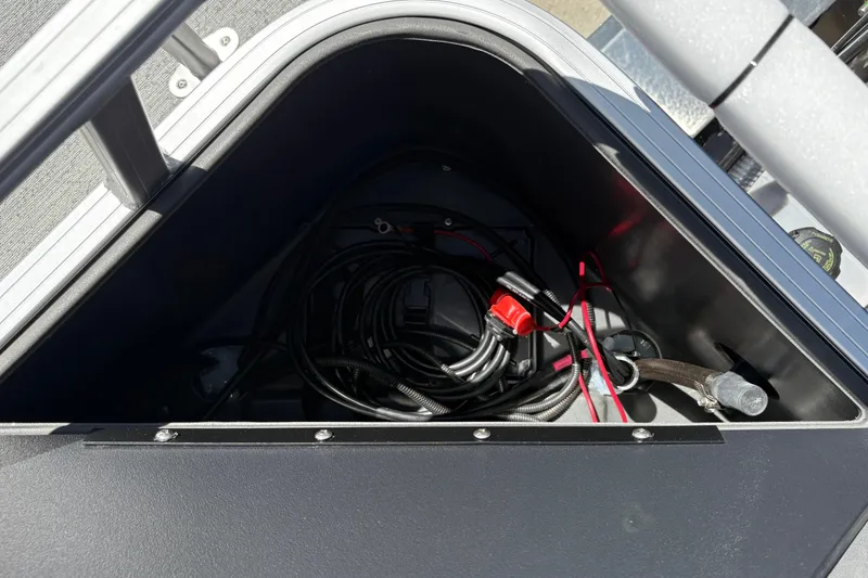 Slide: The Image of Storage compartment with cables in 2026 Sun Tracker Bass Buggy 18 DLX boat. - 28