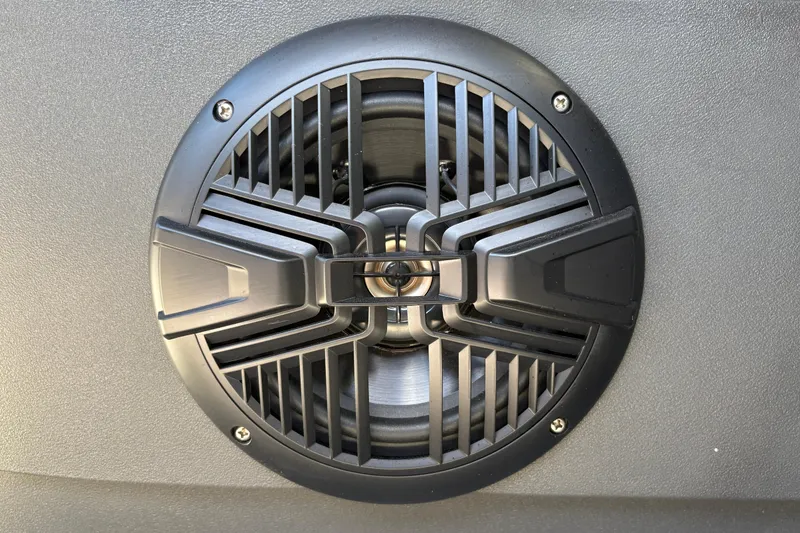 Slide: The Image of Close-up of a speaker grille on a 2026 Sun Tracker Bass Buggy 18 DLX boat. - 30