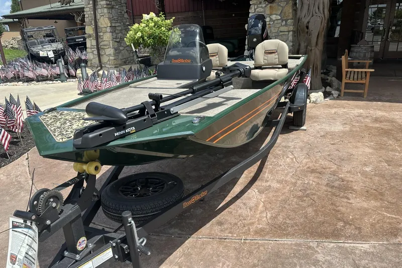 Slide: The Image of 2026 Tracker Bass Tracker Classic Limited boat on trailer, displayed outdoors. - 6