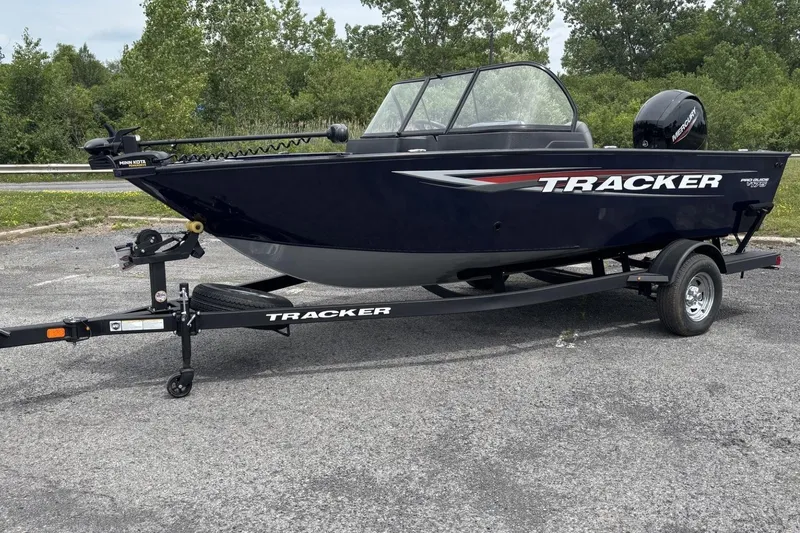 The Image of 2026 Tracker Pro Guide V-175 WT boat on trailer, parked outdoors. - 0
