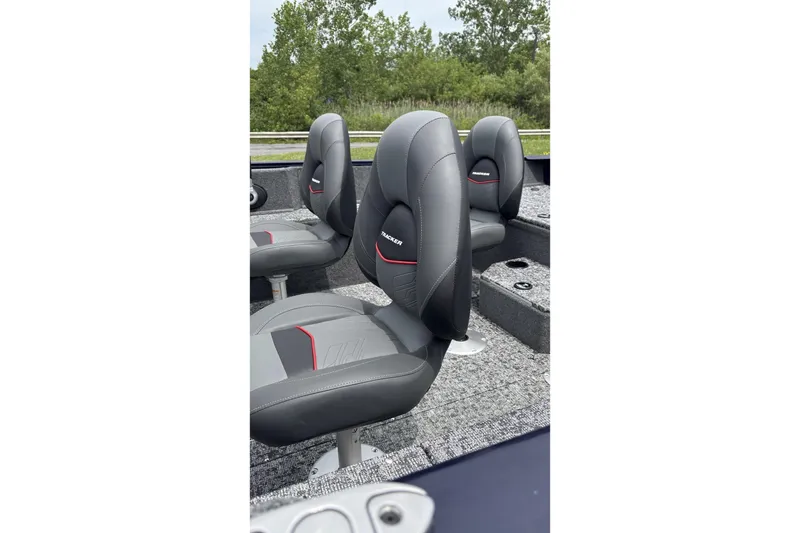 Slide: The Image of 2026 Tracker Pro Guide V-175 WT boat seats, featuring sleek gray design with red accents. - 3