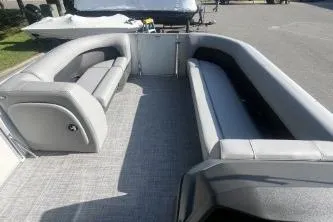 Slide: The Image of 2026 Sun Tracker Party Barge 18 DLX interior with spacious seating and modern design. - 5