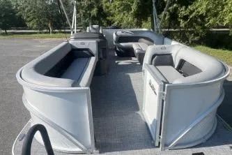 Slide: The Image of 2026 Sun Tracker Party Barge 18 DLX pontoon boat with spacious seating and sleek design. - 3
