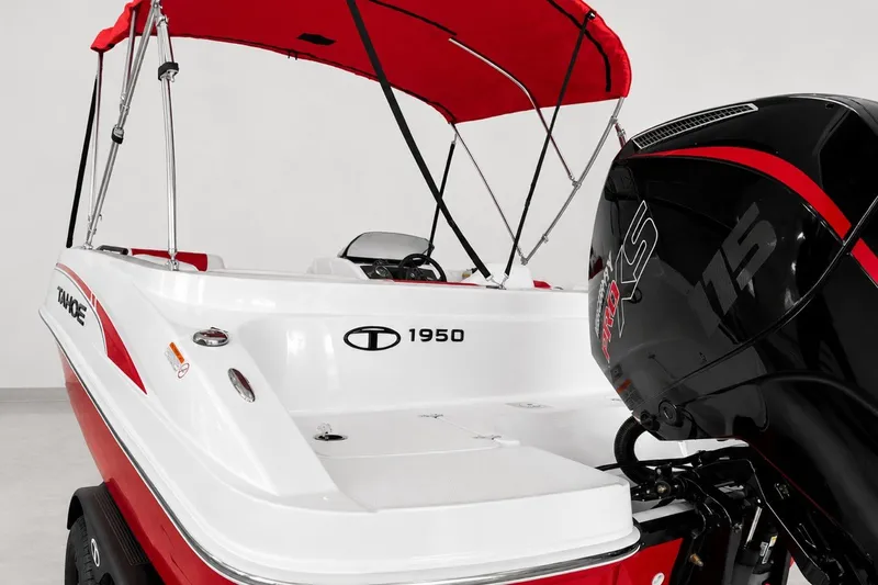 Slide: The Image of Red and white 2026 Tahoe 1950 boat with a powerful outboard motor. - 3