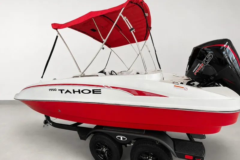 Slide: The Image of Red and white 2026 Tahoe 1950 boat with canopy and Mercury Pro XS engine. - 4
