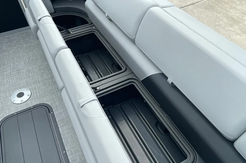 Slide: The Image of Sun Tracker Party Barge 24 XP3 2026 interior storage compartments and seating detail. - 33
