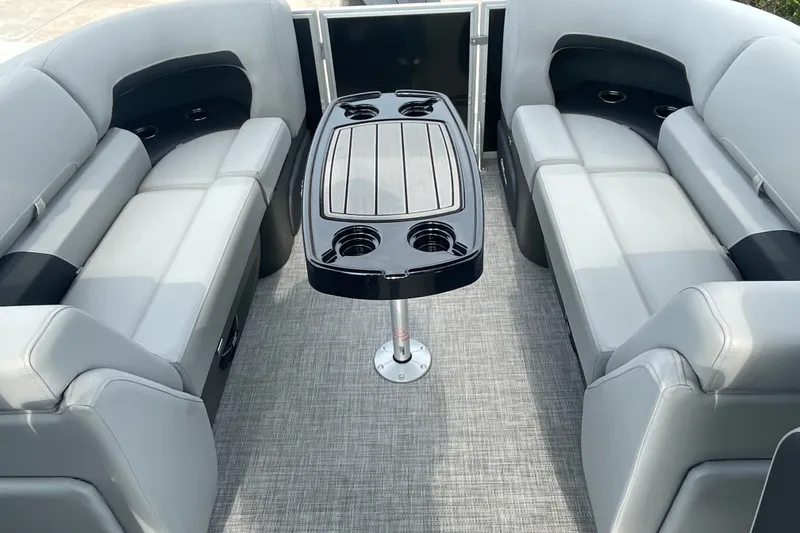 Slide: The Image of Interior of 2026 Sun Tracker Party Barge 24 XP3 with seating and table. - 18