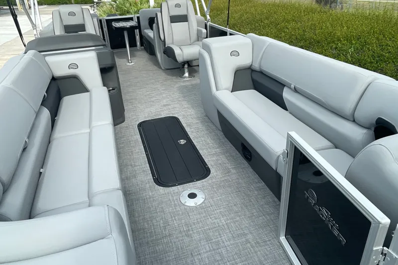 Slide: The Image of 2026 Sun Tracker Party Barge 24 XP3 interior with spacious seating and modern design. - 17