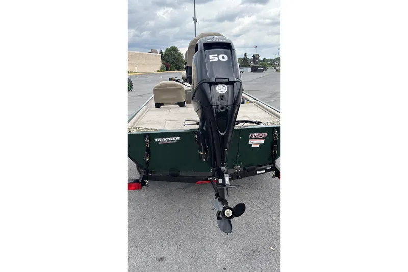 Slide: The Image of 2026 Tracker Bass Tracker Classic Limited boat with Mercury 50 HP outboard motor. - 2