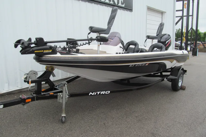 Slide: The Image of 2007 Nitro NX 750 SC fishing boat on trailer, featuring Minn Kota trolling motor. - 2