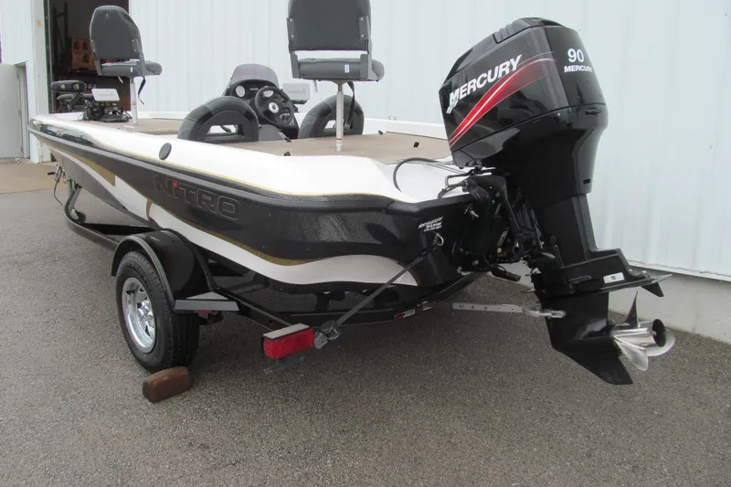 Slide: The Image of 2007 Nitro NX 750 SC boat with Mercury 90 engine on trailer. - 3