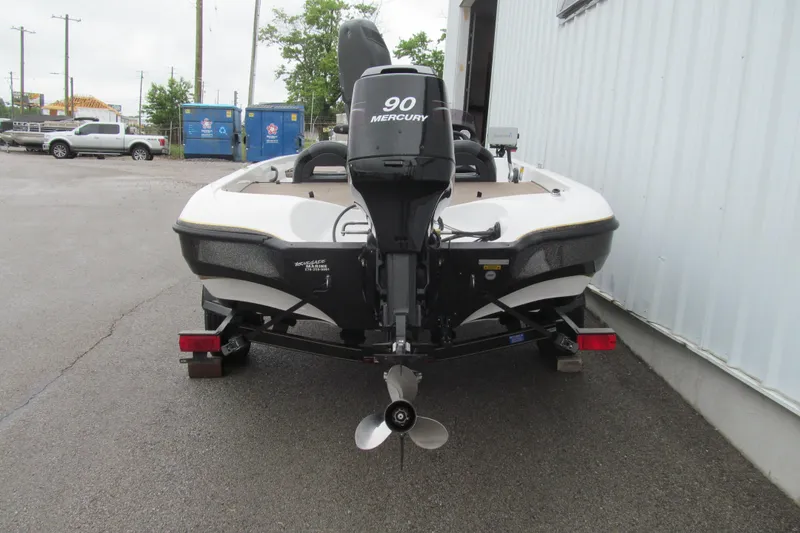 Slide: The Image of 2007 Nitro NX 750 SC boat with Mercury 90 engine, parked on a trailer. - 4