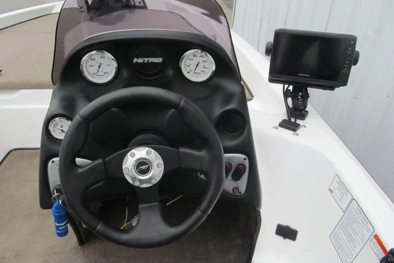 Slide: The Image of Steering console of 2007 Nitro NX 750 SC boat with Garmin GPS and gauges. - 5