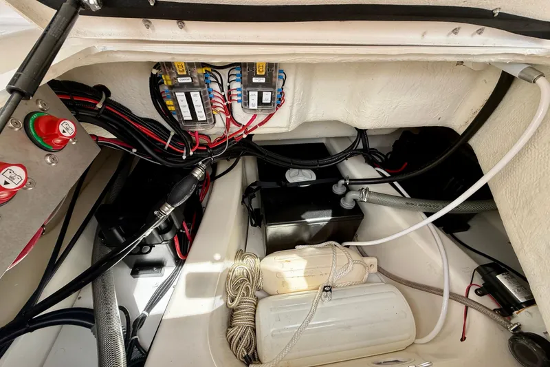 Slide: The Image of 2024 Zodiac Medline 9 boat interior showing electrical wiring and components. - 28