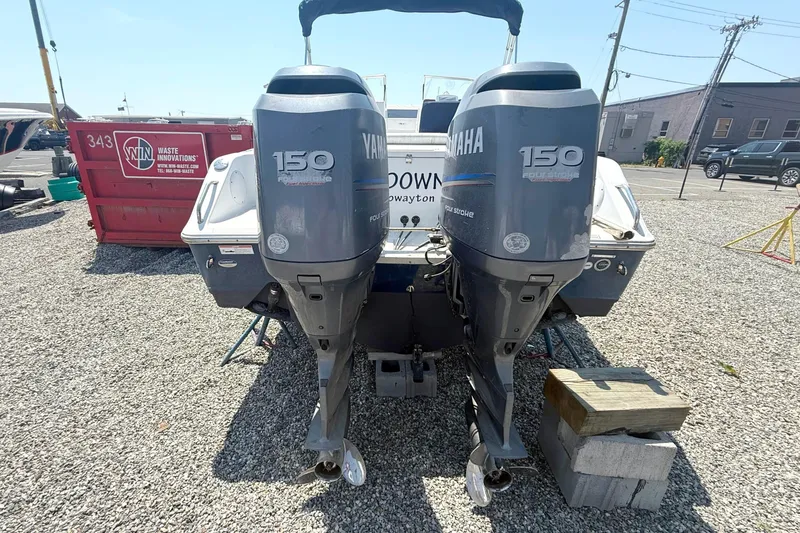 Slide: The Image of 2012 Sea Hunt Escape 250 with Yamaha 150 outboard motors. - 11