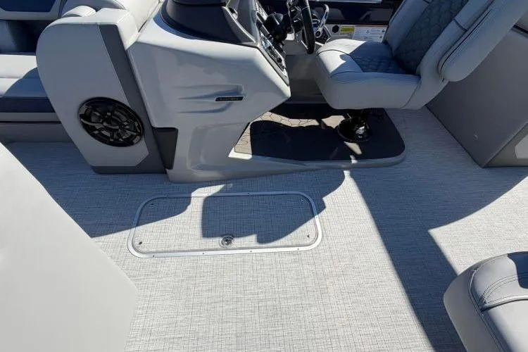 Slide: The Image of 2026 South Bay 523RS boat interior with modern helm and seating. - 6
