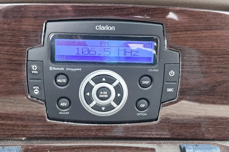 Slide: The Image of Clarion CMS2 stereo system in 2021 Chaparral 237 SSX, tuned to 106.5 MHz FM. - 15