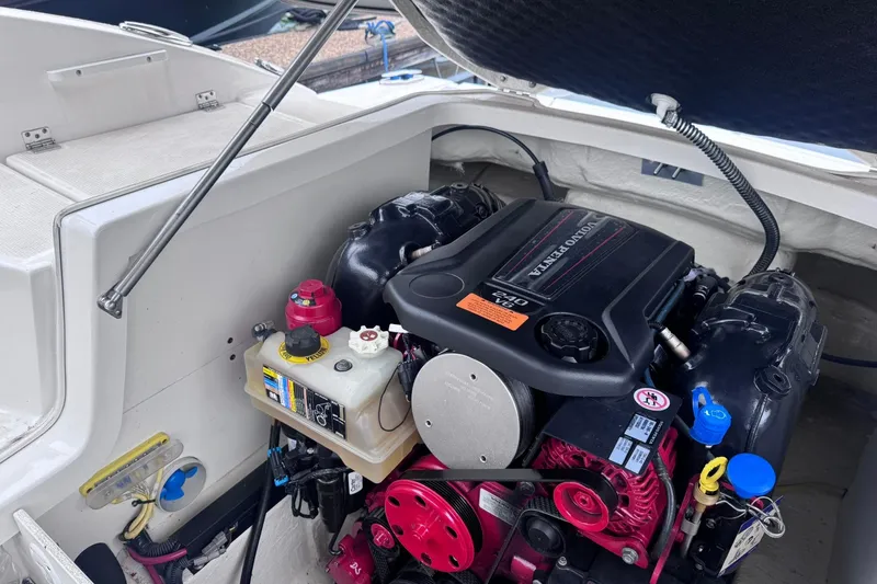 Slide: The Image of 2021 Chaparral 237 SSX boat engine compartment with Volvo Penta V8 engine. - 19