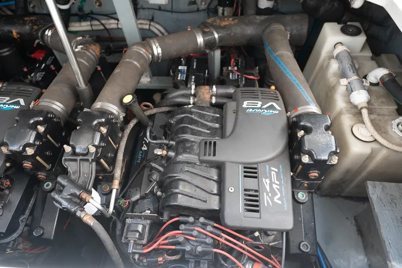 Slide: The Image of Engine compartment of a 2000 Sea Ray 340 Sundancer with MerCruiser V8 engine. - 33