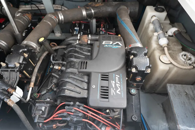 Slide: The Image of Engine compartment of a 2000 Sea Ray 340 Sundancer with MerCruiser 7.4L MPI V8 engine. - 34