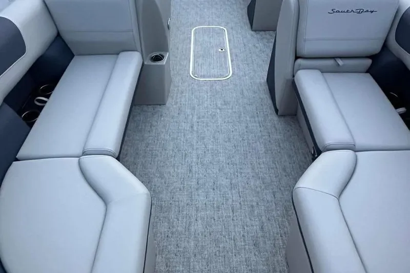 Slide: The Image of Interior of 2026 South Bay 222CR LE pontoon boat with gray seating and carpet. - 6