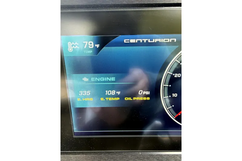 Slide: The Image of Dashboard display of a 2023 Centurion Fi25 showing engine temperature and oil pressure. - 11